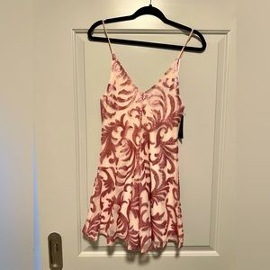 Romeo and Juliet Couture, pink sequined romper NWT